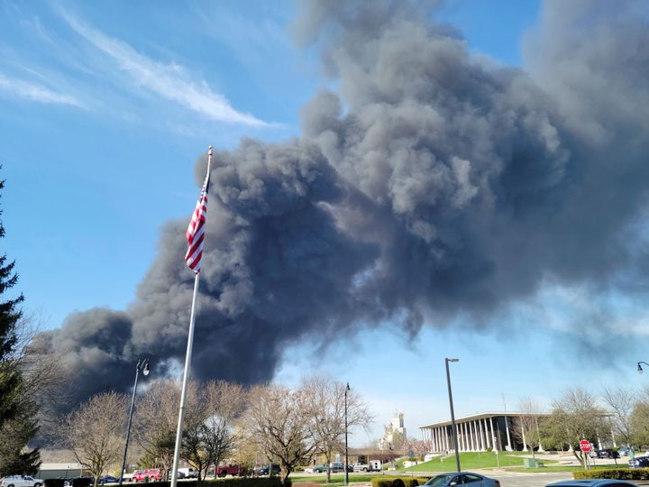 The fire spread from a tractor-trailer containing plastic to the nearby facility, described by the local fire chief as packed "from floor to ceiling and from wall to wall" with plastic. Responding firefighters had limited access to the fire due to the amount of plastic and vehicles surrounding the facility, the fire chief said.