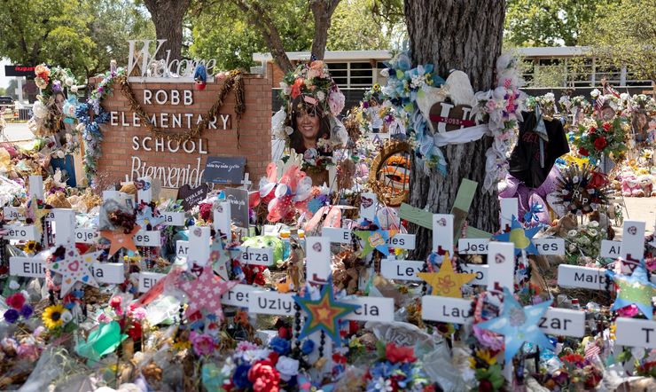 A makeshift memorial outside Robb Elementary School in Uvalde, Texas, where a gunman killed 19 children and two adults.