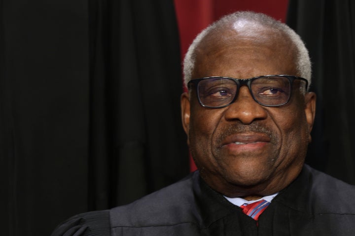 WASHINGTON, DC - OCTOBER 07: United States Supreme Court Associate Justice Clarence Thomas poses for an official portrait at the East Conference Room of the Supreme Court building on October 7, 2022 in Washington, DC. The Supreme Court has begun a new term after Associate Justice Ketanji Brown Jackson was officially added to the bench in September. (Photo by Alex Wong/Getty Images)