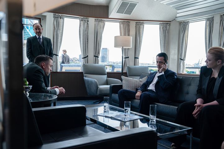 Roman, Kendall and Shiv trying to figure out how to respond to the news of their father Logan's death on HBO's "Succession."