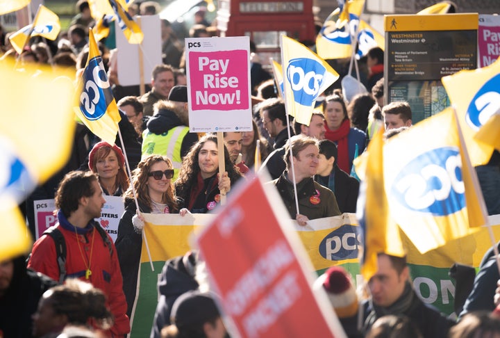 Members of the Public and Commercial Services Union on the picket line in Whitehall, London. 