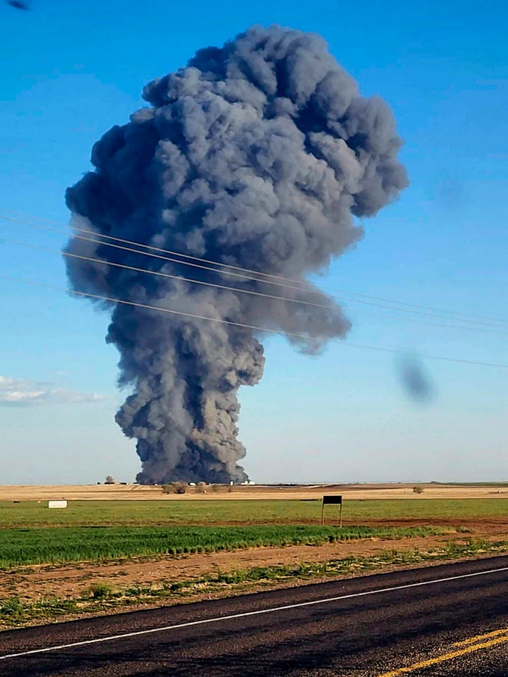 In this photo provided by Castro County Emergency Management, smoke fills the sky after an explosion and fire at the Southfork Dairy Farms near Dimmitt, Texas, on Monday, April 10, 2023.