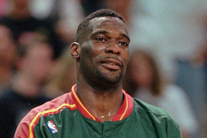 FILE - Shawn Kemp of the Seattle SuperSonics looks on in the final moments of their 96-89 win over the Sacramento Kings in the first round NBA playoffs, Tuesday April 30, 1996, at Arco Arena in Sacramento, Calif. Shawn Kemp was arrested and charged in connection with a drive-by shooting in Tacoma, Washington, and was set to be appear in court Thursday, March 9, 2023, a sheriff's official said. Online jail records show Kemp was booked on a felony charge of drive-by shooting shortly before 6 p.m. Wednesday. (AP Photo/Bob Galbraith, File)