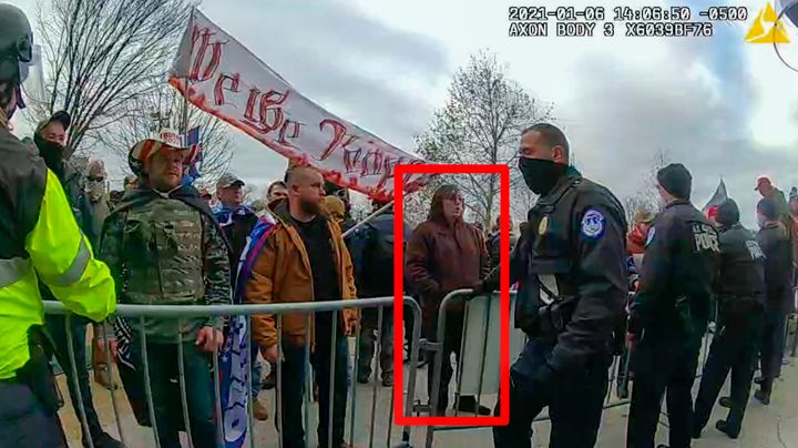 In this image from U.S. Capitol Police video, released and annotated by the Justice Department in the sentencing memorandum, Patrick McCaughey III,, appears on police body-worn camera footage at the U.S. Capitol on Jan. 6, 2021.
