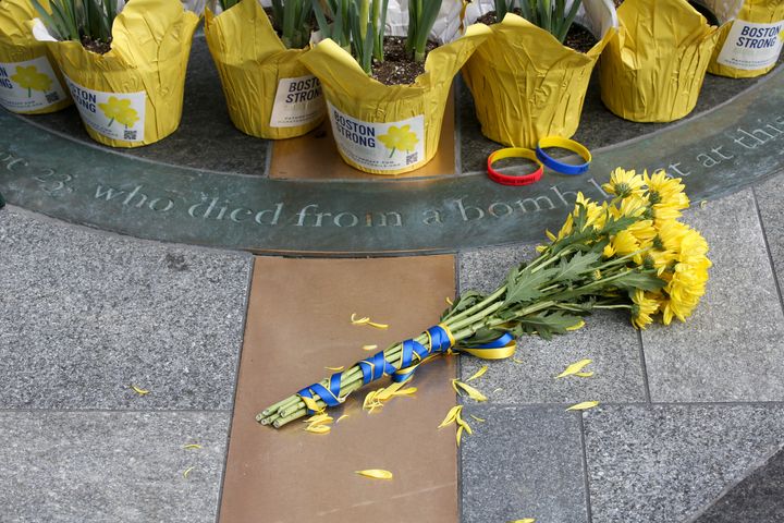 Flowers are placed Saturday at a memorial for victims of the 2013 Boston Marathon bombing.