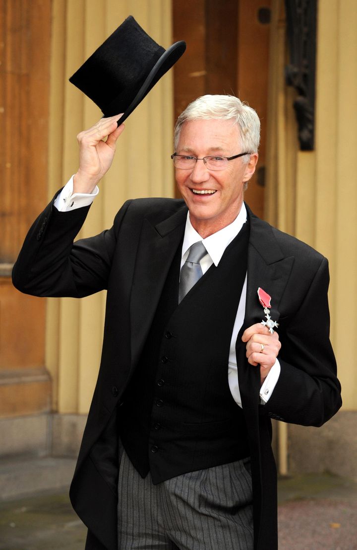 Paul pictured in 2008 after being awarded his MBE