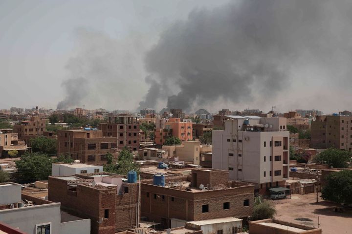 Smoke rises from a central neighborhood of Khartoum, Sudan, on April 16, 2023, after dozens have been killed in two days of intense fighting. 