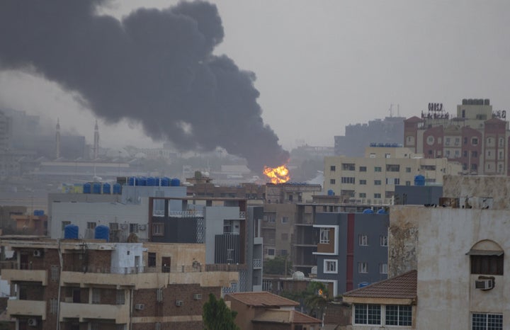 Smoke rises as clashes continue in the Sudanese capital on April 16, 2023, between the Sudanese Armed Forces and the paramilitary Rapid Support Forces (RSF).