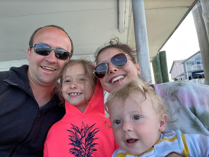 The author, Nate and two of their children on vacation in 2002 in the town where the couple was married.