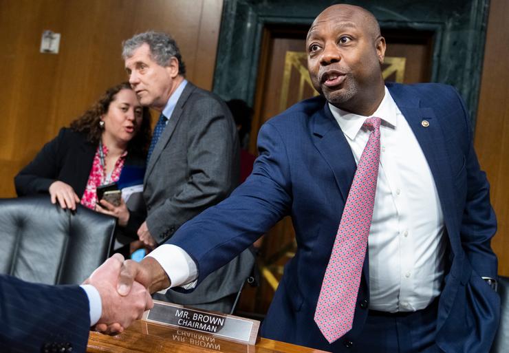 Ranking member Sen. Tim Scott (right) is seen during the Senate Banking, Housing and Urban Affairs Committee hearing in the Dirksen Federal Building on March 28.