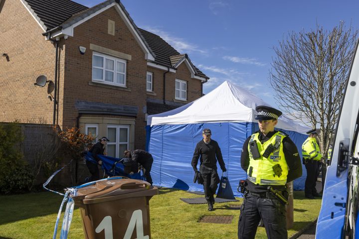 Officers from Police Scotland outside the home of former chief executive of the Scottish National Party (SNP) Peter Murrell, in Uddingston, Glasgow, after he was "released without charge pending further investigation",