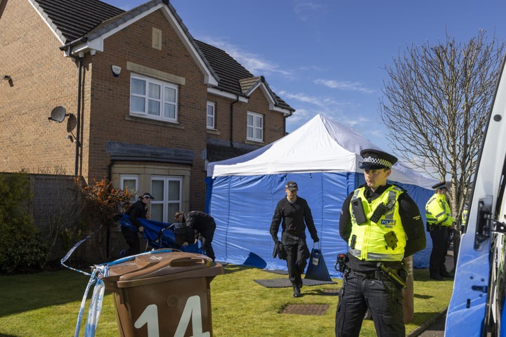 Officers from Police Scotland outside the home of former chief executive of the Scottish National Party (SNP) Peter Murrell, in Uddingston, Glasgow, after he was "released without charge pending further investigation",