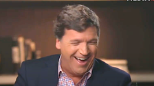 Tucker Carlson Guffaws Over Twitter Layoffs In Elon Musk Interview