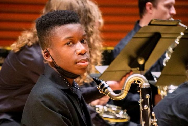 Ralph Yarl, a Black 16-year-old who was shot and wounded by a homeowner after mistakenly going to the wrong house to pick up his siblings, holds a bass clarinet in this picture obtained from social media.
