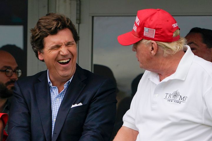 Tucker Carlson, left, and former US president Donald Trump in 2022.
