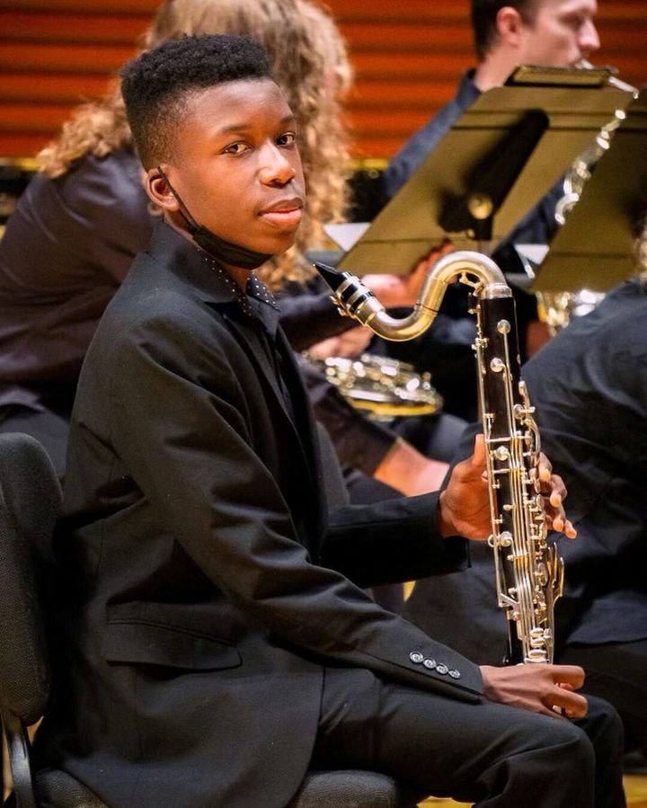 Ralph Yarl, a Black 16-year-old who was shot and wounded by a homeowner after mistakenly going to the wrong house to pick up his siblings, holds a bass clarinet in this picture obtained from social media.
