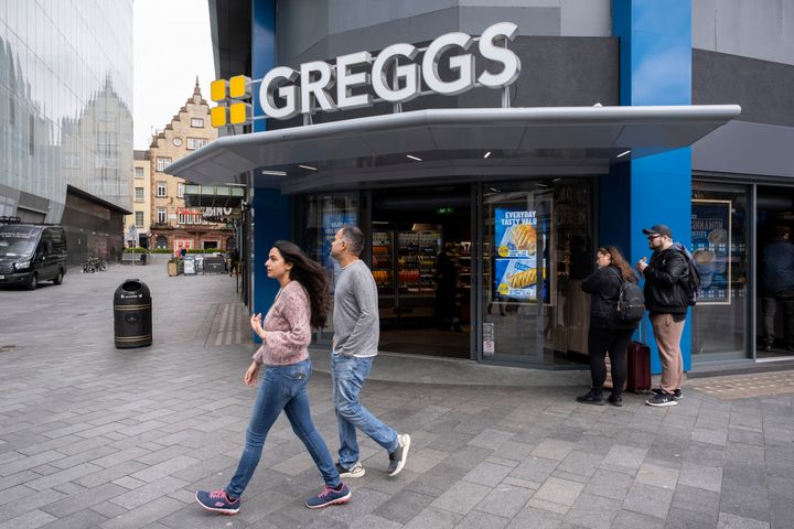 People outside the new flagship Greggs store in Leicester Square.