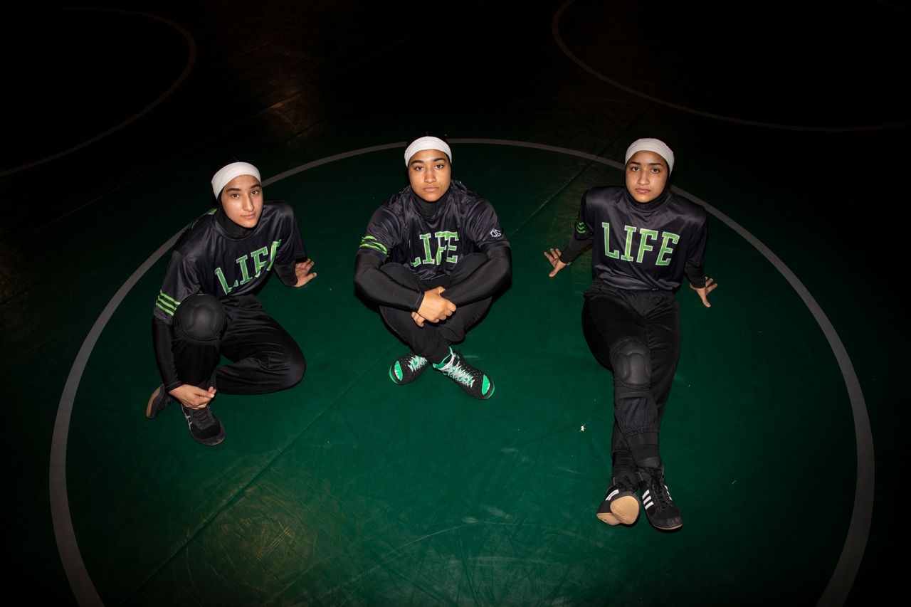 Left to right, sisters Jamilah, 20, Latifah, 18, and Zaynah McBryde, 17, are on the wrestling team at Life University in Marietta, Georgia.