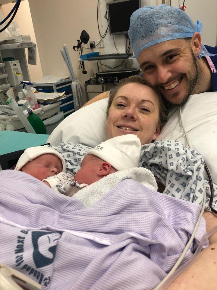 Carol-Ann Reid and her husband with their twin babies.