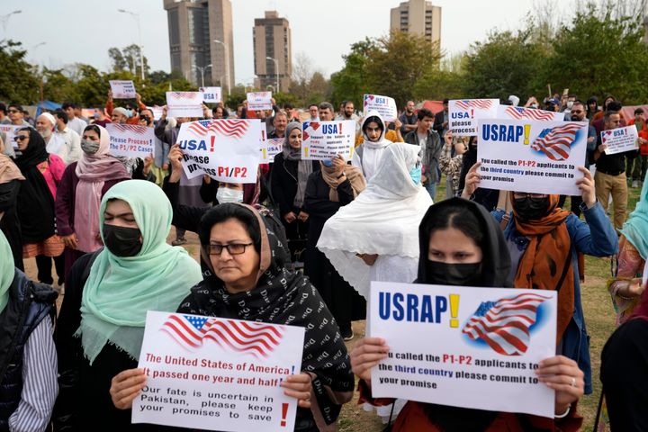 Afghan refugees protest in Islamabad, Pakistan, on Feb. 26 as the U.S. government’s programs meant to fast-track visas for at-risk Afghans, including those who worked with U.S. organizations, drag on for months.