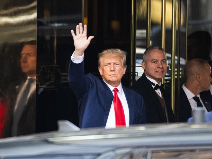 Former President Donald Trump exits Trump Tower as he heads to a courthouse in Manhattan for his April 4 arraignment in a hush-money case.