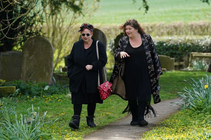 Jo Brand and Cheryl Fergison arrive at Paul O'Grady's funeral