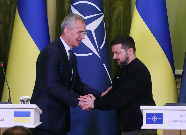 NATO Secretary General Jens Stoltenberg and Ukrainian President Volodymyr Zelensky shake hands during a joint a press-conference, following their meeting in Kyiv on 20 April 2023.