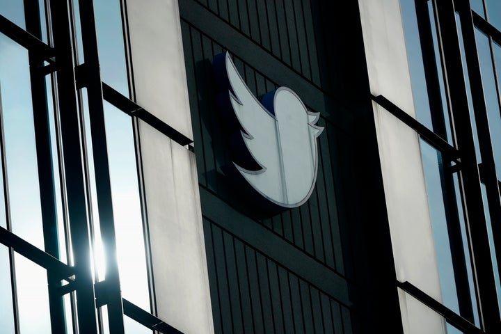 FILE - A Twitter logo hangs outside the company's offices in San Francisco, on Dec. 19, 2022.