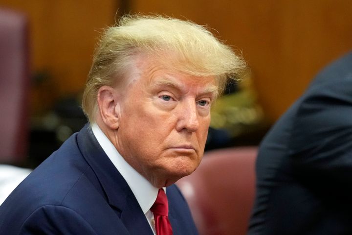 FILE - Former President Donald Trump appears in court for his arraignment, April 4, 2023, in New York. Jury selection is set to start Tuesday, April 25, 2023, in the case involving allegations by advice columnist E. Jean Carroll, who says Trump raped her in a luxury department store dressing room in the 1990s. (AP Photo/Seth Wenig, Pool)