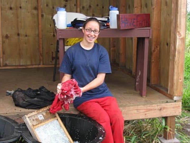 Faith, age 14 in 2009, at a program in Hawaii called Pacific Quest. "Though located in paradise, it was anything but," the author writes. "Here she is washing her clothes on a washboard."