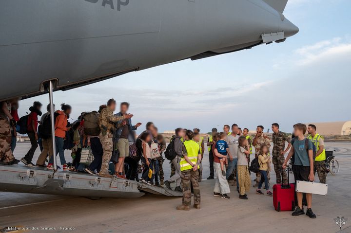 French citizens arrive at the air base of the French Army forces stationed in Djibouti as French soldiers evacuate French nationals from Sudan to Djibouti, in Djibouti, April 23, 2023.