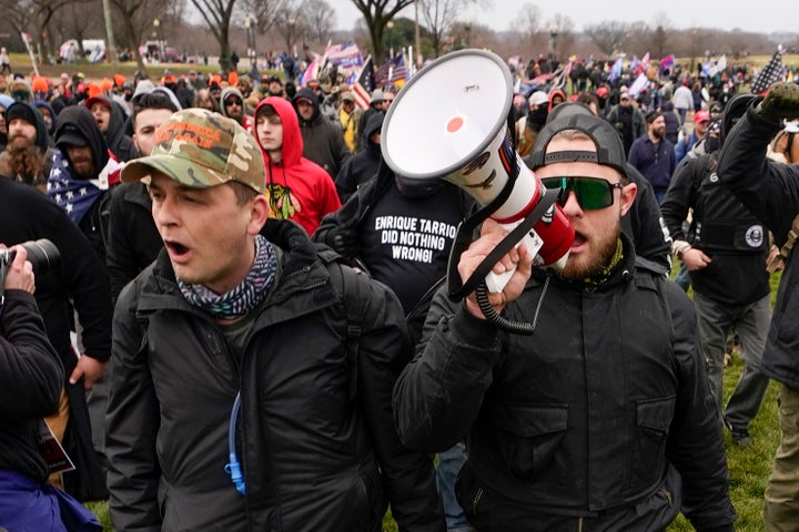 Proud Boys members Zachary Rehl, left, and Ethan Nordean, left, walk toward the U.S. Capitol in Washington, in support of President Donald Trump on Jan. 6, 2021. (AP Photo/Carolyn Kaster, File)