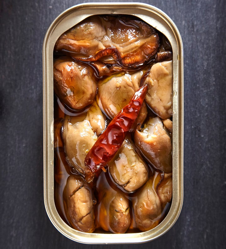 Smoked whole oysters tinned with olive oil and cayenne pepper.