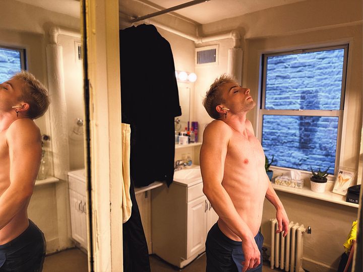Tony d’Alelio warms up with isolations in his dressing room at New York's Music Box Theatre.