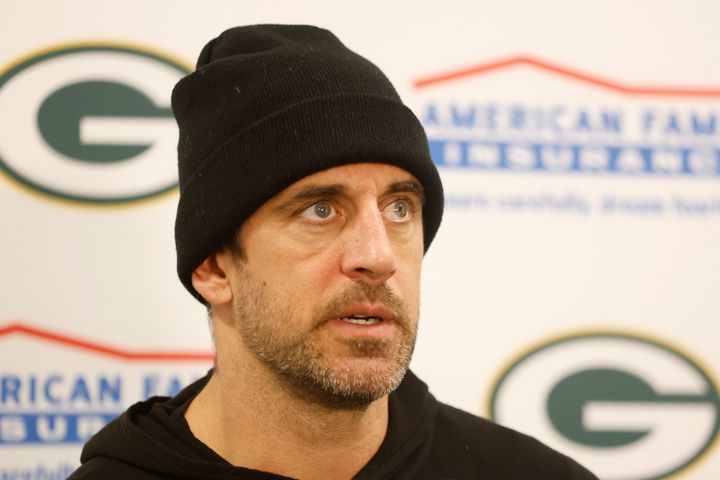 Aaron Rodgers answers questions during a press conference following a game against the Miami Dolphins on Dec. 25, 2022.