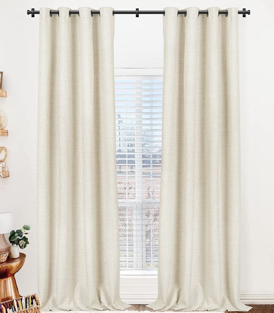 A pair of linen blackout curtains for some warmth and texture