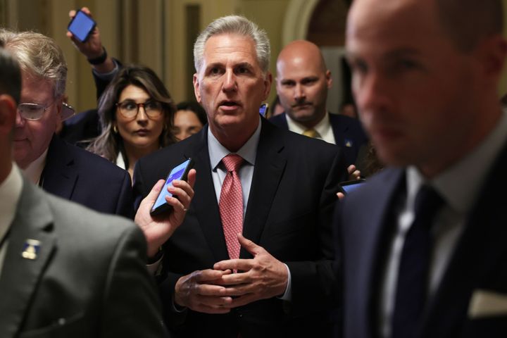 Speaker of the House Kevin McCarthy (R-Calif.) faces questions by reporters about House Republicans' plan to cut the deficit by nearly $5 trillion and raise the debt limit.