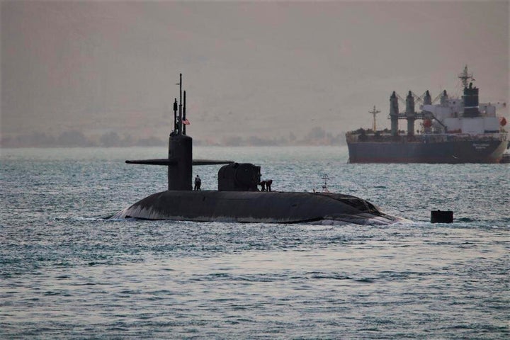 This photo released by the US Navy show a guided-missile submarine capable of carrying up to 154 Tomahawk missiles. The Navy said the nuclear-powered submarine, based out of Kings Bay, Georgia, passed through the Suez Canal on April 7, 2023. 