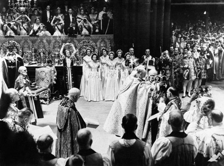 Queen Elizabeth II being crowned by the Archbishop of Canterbury during the Coronation at Westminster Abbey, London.