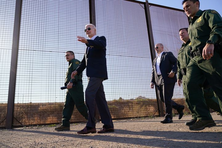 FILE - President Joe Biden walks along a stretch of the U.S.-Mexico border in El Paso Texas, Jan. 8, 2023. The Biden administration will open migration centers in South and Central America for asylum seekers heading to the U.S.-Mexico border, in a bid to slow what’s expected to be a surge of migrants seeking to cross the border next month as pandemic-era immigration restrictions end, U.S. officials said Thursday, April 27. (AP Photo/Andrew Harnik, File)