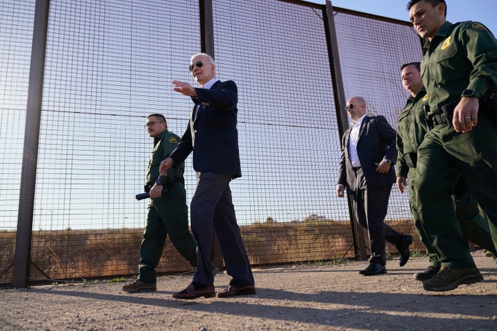 FILE - President Joe Biden walks along a stretch of the U.S.-Mexico border in El Paso Texas, Jan. 8, 2023. The Biden administration will open migration centers in South and Central America for asylum seekers heading to the U.S.-Mexico border, in a bid to slow what’s expected to be a surge of migrants seeking to cross the border next month as pandemic-era immigration restrictions end, U.S. officials said Thursday, April 27. (AP Photo/Andrew Harnik, File)