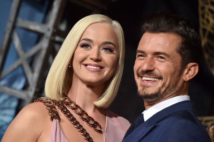 Katy Perry and Orlando Bloom attend the premiere of "Carnival Row" on Aug. 21, 2019, in Hollywood. Perry will be performing at King Charles' and Queen Camilla's Coronation Concert.