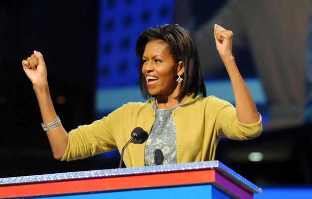 First lady Michelle Obama wore many cardigans throughout her time in the White House, starting with this mustard yellow number during the inauguration festivities in 2009.