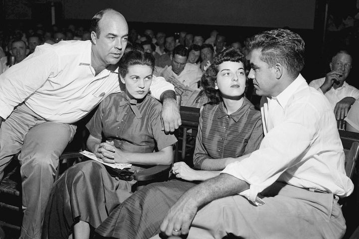 FILE - In this Sept. 23, 1955, file photo, J.W. Milam, left, his wife, second from left, Roy Bryant, far right, and his wife, Carolyn Bryant, sit together in a courtroom in Sumner, Miss. Carolyn Bryant Donham, the white woman who accused Black teenager Emmett Till of making improper advances before he was lynched in Mississippi in 1955 has died Tuesday night, April 25, in hospice care in Louisiana, according to a death report filed Thursday, April 27, 2023, in Calcasieu Parish Coroner’s Office in Louisiana. She was 88. (AP Photo/File)