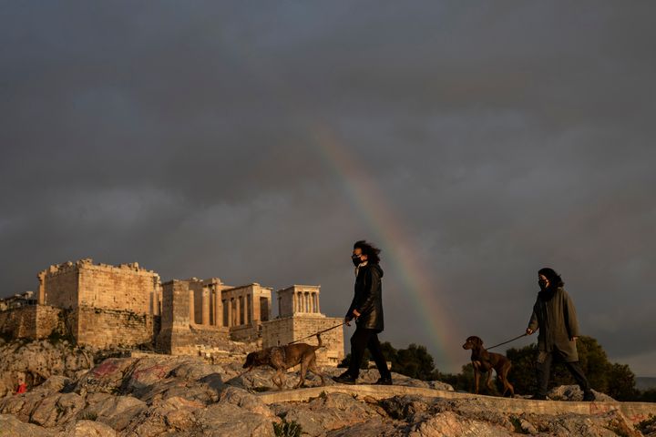 Greece's culture ministry announced on Thursday, April 27, 2023, that pets will soon be allowed into more than 120 archaeological sites across the country, although not in some of the top tourist draws such as the Acropolis in Athens. (AP Photo/Petros Giannakouris, File)