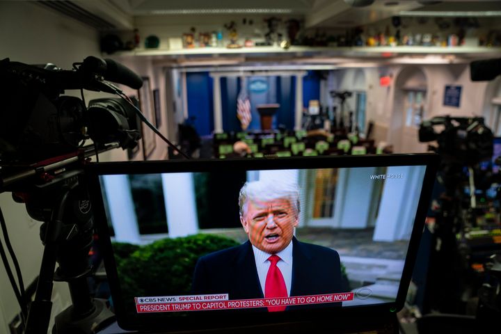 WASHINGTON, DC - JANUARY 6: President Donald J. Trump's recorded message is seen on a television screen in the briefing room as supporters are removed from the Capitol building, at the White House on Wednesday, Jan 06, 2021 in Washington, DC. (Photo by Jabin Botsford/The Washington Post via Getty Images)