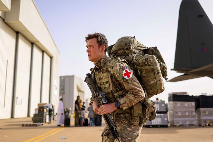 A member of the medical team from the Duke of Lancaster's Regiment is seen during the evacuation of British citizens, at Wadi Seidna airport, Sudan April 27.