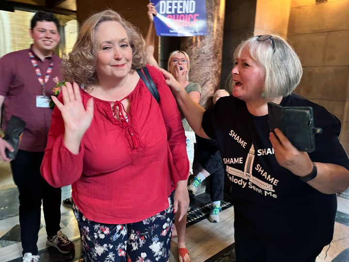 Sen. Carol Blood waves to a crowd of supporters in the Nebraska Capitol rotunda after the failure of a bill that would have banned abortion around the sixth week of pregnancy, on April 27, 2023 in Lincoln, Neb.