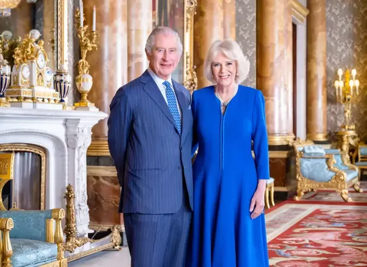 Charles and Camilla pictured in Buckingham Palace. 