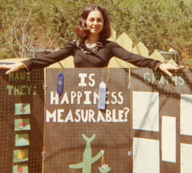 The author in high school with a science fair project she made.